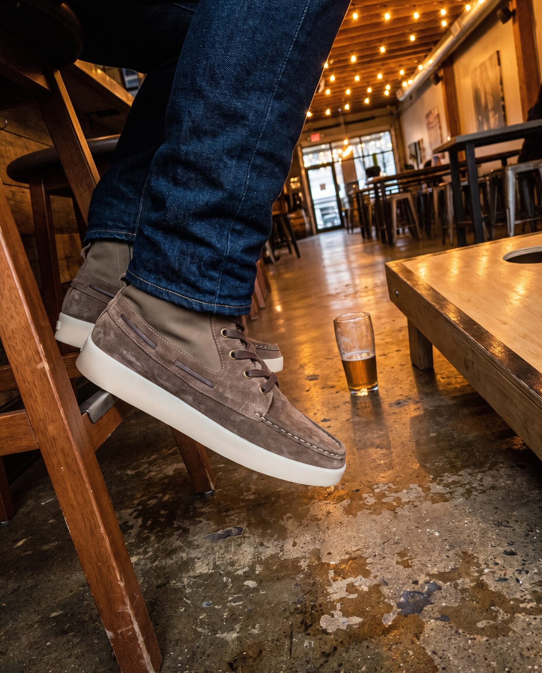Park City Surfer boots worn in a taproom